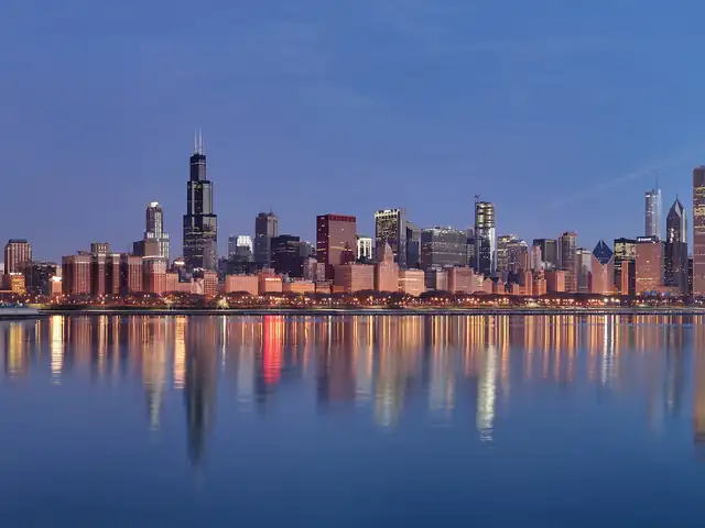 Chicago skyline at sunrise reflected in Lake Michigan